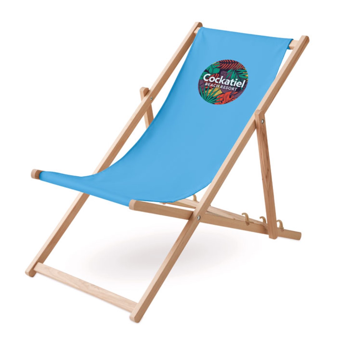 Beach gadget with logo Wooden chair HONOPU Beach gadget with logo beach chair in wood. Max: weight 120 kg. Made in EU. This item can only be delivered in multiples of outer packaging being 2 pieces. Depending on the surface we can use embroidery, engraving, 360° imprint or screen print.