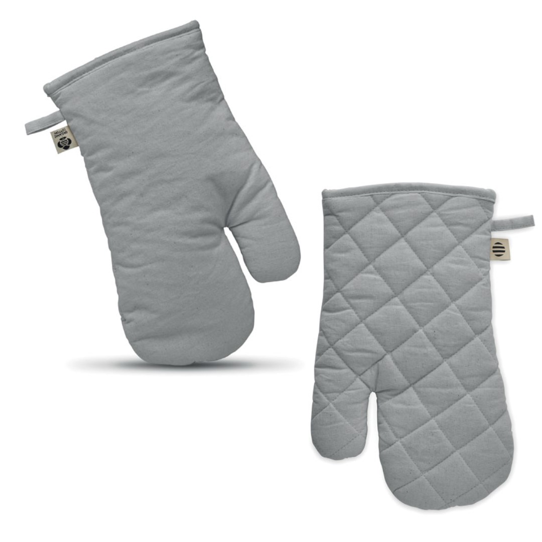 Kitchen gadget with logo Glove NEVON Branded with your logo to the front these soft gloves are the perfect giveaway for any food related business. Organic cotton kitchen oven glove. 170 gr/m². Produced under a certified standard for the use of harmful substances in textile. Magnus Business Gifts is your partner for merchandising, gadgets or unique business gifts since 1967. Certified with Ecovadis gold 2022!