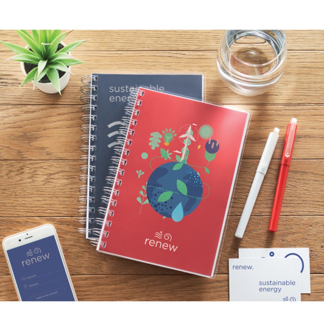 Notebook with logo ANOTATE A5 notebook with logo and RPET cover. 160 Lined paper pages (80 sheets). This notebook is ideal for all your notes during office meetings or at school. Items made from recycled PET plastic make for a perfect conscious promotional give-away. Dimensions: 14X21CM Width: 21 cm Length: 14 cm Depending on the surface we can use embroidery, engraving, 360° imprint or screen print.