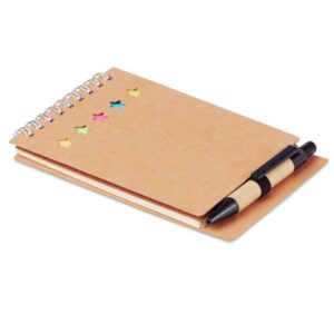 Notebook with logo MULTIBOOK Recycled notebook with logo and pen and sticky memo pad. Soft recycled paper cover. Twin-wired. 40 lined sheets. Elastic pen holder. 25 sheet sticky notes pads and 5 assorted colors page markers. Push button ball pen in recycled carton and biodegradable plastic. Blue ink. Dimensions: 13X9X0,5CM Width: 9 cm Length: 13 cm Height: 0.5 cm Depending on the surface we can use embroidery, engraving, 360° imprint or screen print.