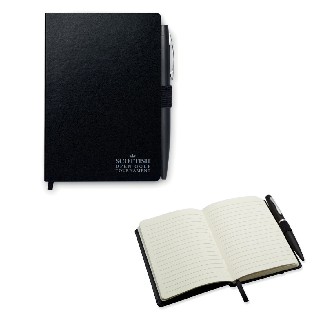 Notebook with logo NOTALUX A6 Notebook with logo and pen. Hard PU cover. Casebound. 144 lined pages (72 sheets). Matching elastic closure strap, ribbon bookmark and pen holder. Matching metal push button ball pen. Blue ink. Dimensions: 14,5X10X1,2CM Width: 10 cm Length: 14.5 cm Height: 1.2 cm Depending on the surface we can use embroidery, engraving, 360° imprint or screen print.