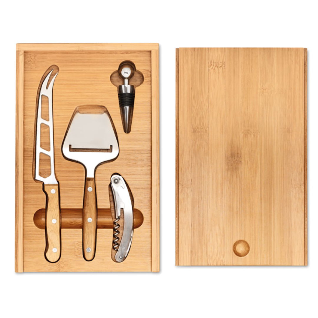 Wine accessoire with logo set WINE&CHEESE Bamboo cheese and wine set. Presented in bamboo box. Includes a stainless steel-knife, cheese peeler, bottle opener and wine stopper. Available color: Wood Dimensions: 29X20X3,6 CM Width: 20 cm Length: 29 cm Height: 3.6 cm Volume: 3.1 cdm3 Gross Weight: 1.324 kg Net Weight: 1.241 kg Magnus Business Gifts is your partner for merchandising, gadgets or unique business gifts since 1967. Certified with Ecovadis gold!