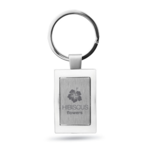 Gadget with logo Key ring HARROBS Metal rectangular key ring with logo. Individually packed in a gift box. Available color: Shiny Silver Dimensions: 8X3,5X0,5 CM Width: 3.5 cm Length: 8 cm Height: 0.5 cm Volume: 0.11 cdm3 Gross Weight: 0.039 kg Net Weight: 0.03 kg Magnus Business Gifts is your partner for merchandising, gadgets or unique business gifts since 1967. Certified with Ecovadis gold!