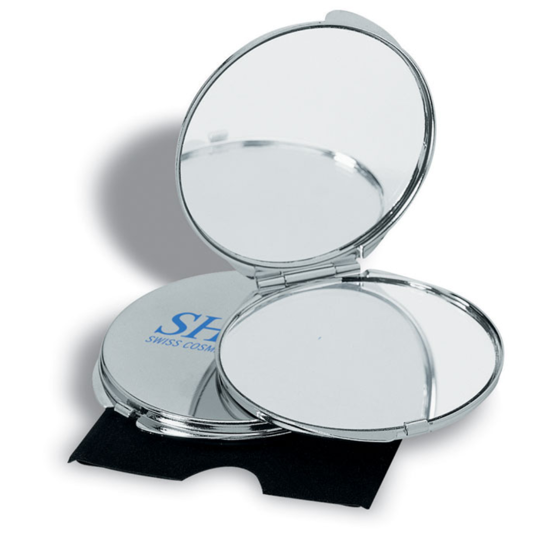 Gadget with logo Mirror GUAPAS Chrome plated metal make up mirror with logo with regular and magnifying mirrorsin velvet case. Available color: Shiny Silver Dimensions: Ø6X0,5 CM Height: 0.5 cm Diameter: 6 cm Volume: 0.108 cdm3 Gross Weight: 0.053 kg Net Weight: 0.045 kg Magnus Business Gifts is your partner for merchandising, gadgets or unique business gifts since 1967. Certified with Ecovadis gold!