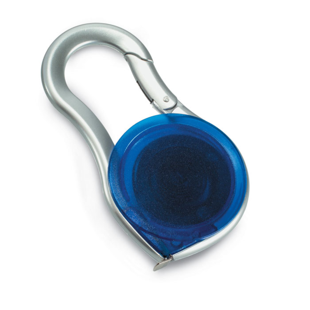Gadget with logo Measuring tape METRICA Measuring tape with carabiner with logo. 1.78 metres long. Available color: Transparent Blue Dimensions: 8,5X4,7X1 CM Width: 4.7 cm Length: 8.5 cm Height: 1 cm Volume: 0.068 cdm3 Gross Weight: 0.026 kg Net Weight: 0.023 kg Magnus Business Gifts is your partner for merchandising, gadgets or unique business gifts since 1967. Certified with Ecovadis gold!