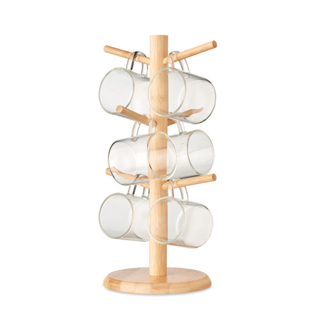 Gadget with logo Bamboo holder set BOROCUPS Set of bamboo cup holder including 6 borosilicate glass cups with logo. Capacity: 200 ml per cup. Product assembly required. You can hang the 6 included glass cups by their handles on the stand. The cups are made from borosilicate glass so they are perfect for warm liquids such as coffee, tea or hot chocolate Dimensions: 19X34CM Width: 34 cm Length: 19 cm Volume: 9.375 cdm3 Gross Weight: 1.328 kg Net Weight: 0.547 kg Magnus Business Gifts is your partner for merchandising, gadgets or unique business gifts since 1967. Certified with Ecovadis gold!