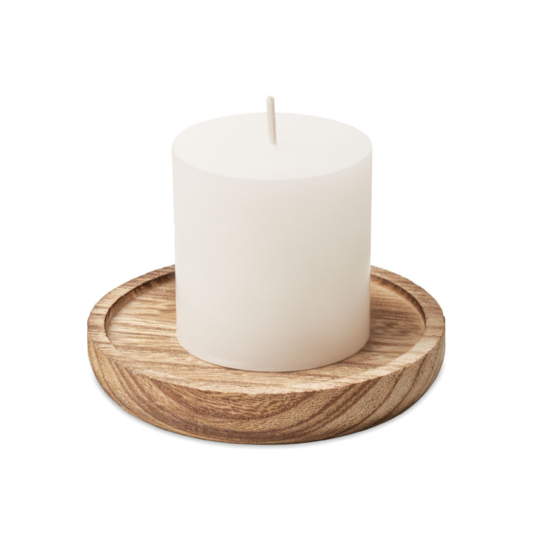 Gadget with logo Candle PENTAS Round shaped wooden decorative base with vanilla fragranced candle with logo. Burn time: 12 hours. Set the perfect mood at home with some candles. The wooden plate will give a stylish and natural look to your home. Wood is a natural product, there may be slight variations in colour and size per item, which can affect the final decoration outcome. Dimensions: Ø9X6.8CM Height: 6.8 cm Diameter: 9 cm Volume: 0.74 cdm3 Gross Weight: 0.152 kg Net Weight: 0.114 kg Magnus Business Gifts is your partner for merchandising, gadgets or unique business gifts since 1967. Certified with Ecovadis gold!