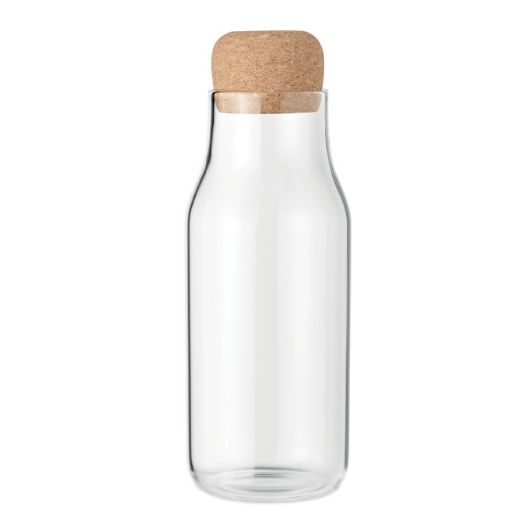 Water bottle with logo OSNA Small Borosilicate glass bottle with logo with cork lid. Capacity: 600 ml. Store your fresh made juices,water or other drinks in this glass bottle. Because it is made fromborosilicate glass, it can also hold hot liquids. The cork lid gives thedecanter a natural look. Laser engraving is notpossible on borosilicate glass. Available color: Transparent Dimensions: Ø7X21.5CM Height: 21.5 cm Diameter: 7 cm Volume: 2.12 cdm3 Gross Weight: 0.3 kg Net Weight: 0.204 kg Magnus Business Gifts is your partner for merchandising, gadgets or unique business gifts since 1967. Certified with Ecovadis gold!