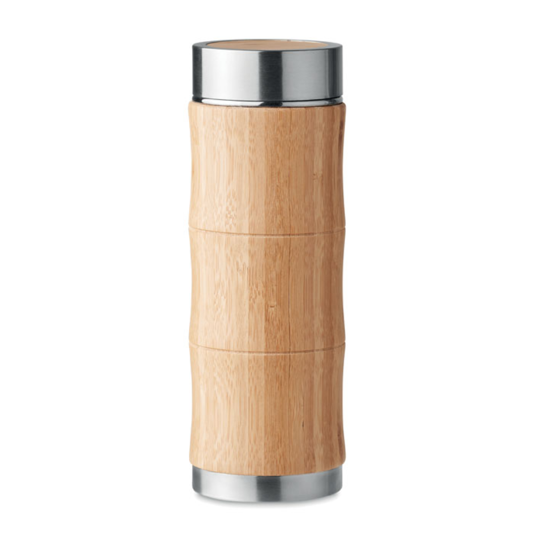 Water bottle with logo BRANCA Double wall vacuum insulated stainless steel water bottle with logo with a bamboo cover and additional tea infuser. Capacity 350 ml. Leak free. The bamboo cover gives the bottle a nice natural look that will make it stand out from all the other bottles. Bamboo is a natural product, there may be slight variations in colour and size per item, which can affect the final decoration outcome. Available color: Wood Dimensions: Ø6.5X20CM Height: 20 cm Diameter: 6.5 cm Volume: 1.36 cdm3 Gross Weight: 0.33 kg Net Weight: 0.323 kg Magnus Business Gifts is your partner for merchandising, gadgets or unique business gifts since 1967. Certified with Ecovadis gold!