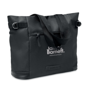 Gadget with logo bag DAEGU BAG 600D 2 tone RPET shopping bag with logo with zippered front and inside pocket with magnetic button closure. Take this bag with you for daily grocery shopping or other shopping activities. The zippered pockets in the front and inside can be used to store smaller items or personal belongings such. The bag can be closed thanks to the easy to use magnetic closure. This tote bag is made from recycled PET plastic. Available color: Black Dimensions: 38X15X35CM Width: 15 cm Length: 38 cm Height: 35 cm Volume: 2.2 cdm3 Gross Weight: 0.35 kg Net Weight: 0.287 kg Magnus Business Gifts is your partner for merchandising, gadgets or unique business gifts since 1967. Certified with Ecovadis gold!