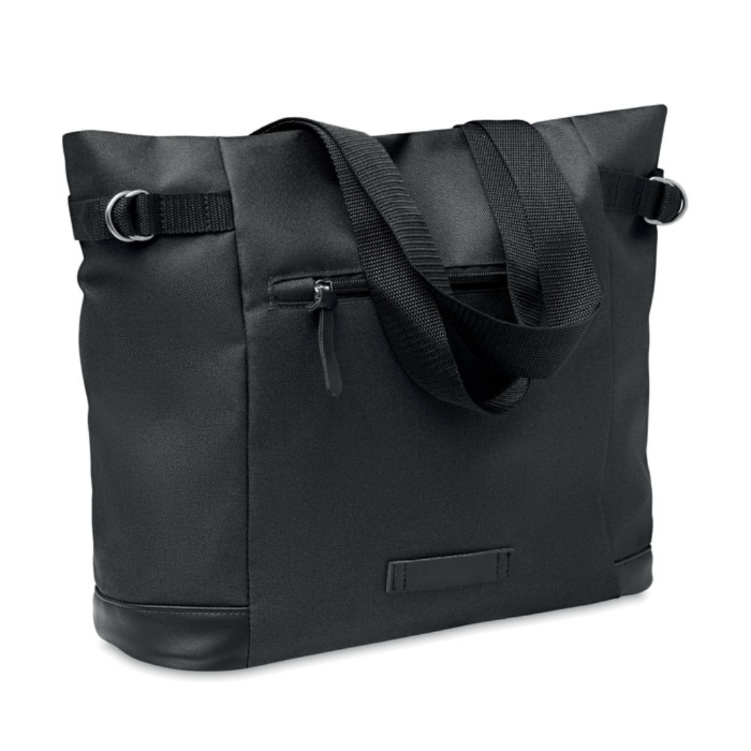 Gadget with logo bag DAEGU BAG 600D 2 tone RPET shopping bag with logo with zippered front and inside pocket with magnetic button closure. Take this bag with you for daily grocery shopping or other shopping activities. The zippered pockets in the front and inside can be used to store smaller items or personal belongings such. The bag can be closed thanks to the easy to use magnetic closure. This tote bag is made from recycled PET plastic. Available color: Black Dimensions: 38X15X35CM Width: 15 cm Length: 38 cm Height: 35 cm Volume: 2.2 cdm3 Gross Weight: 0.35 kg Net Weight: 0.287 kg Magnus Business Gifts is your partner for merchandising, gadgets or unique business gifts since 1967. Certified with Ecovadis gold!