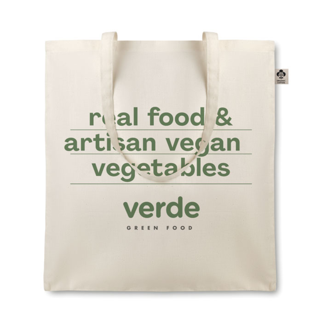 Gadget with logo Bag ORGANIC COTTONEL Organic cotton shopping bag with logo with long handles. 105 gr/m². Made from organic cotton produced under a certified label. Available color: Beige Dimensions: 38X42CM Width: 42 cm Length: 38 cm Volume: 0.204 cdm3 Gross Weight: 0.049 kg Net Weight: 0.045 kg Magnus Business Gifts is your partner for merchandising, gadgets or unique business gifts since 1967. Certified with Ecovadis gold!