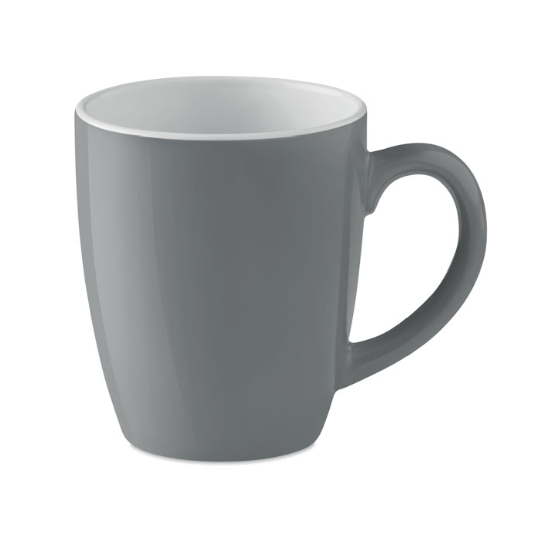 Mug with logo COLOUR TRENT Ceramic coloured mug. Capacity: 290 ml. A simple coloured mug for your favourite morning coffee or tea. Available color: Dark Navy, Black, Orange, Yellow, Green, Royal Blue, Blue, Grey A simple coloured mug for your favourite morning coffee or tea. Magnus Business Gifts is your partner for merchandising, gadgets or unique business gifts since 1967. Certified with Ecovadis gold!