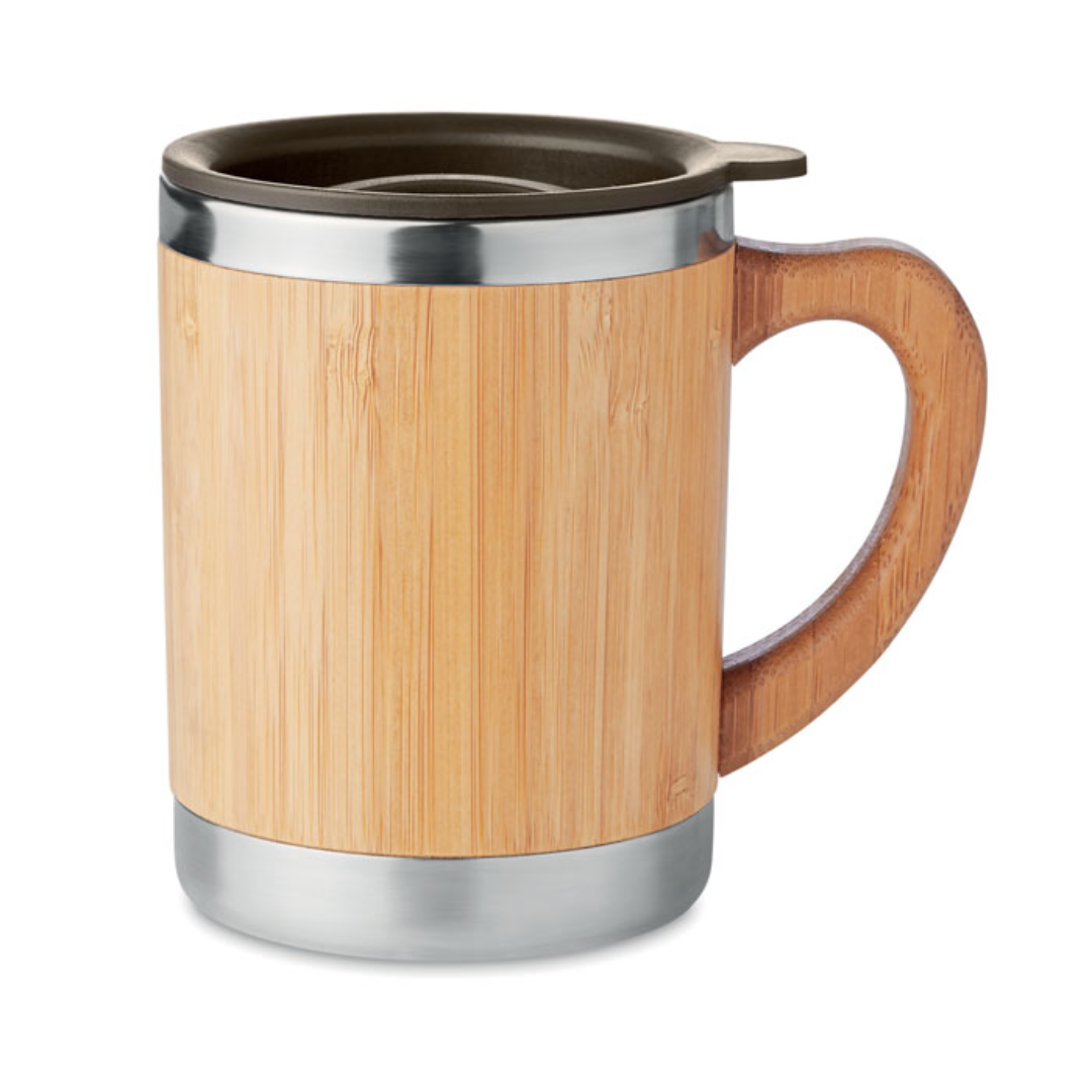 Tumbler with logo MOKKA Double wall Stainless Steel tumbler with bamboo case and moveable drink hole. Capacity 300 ml. Bamboo is a natural product, there may be slight variations in colour and size per item, which can affect the final decoration outcome. Available color: Black, Wood Dimensions: 11X10.5CM Width: 11 cm Height: 10.5 cm Volume: 1.33 cdm3 Gross Weight: 0.189 kg Net Weight: 0.165 kg Magnus Business Gifts is your partner for merchandising, gadgets or unique business gifts since 1967. Certified with Ecovadis gold!