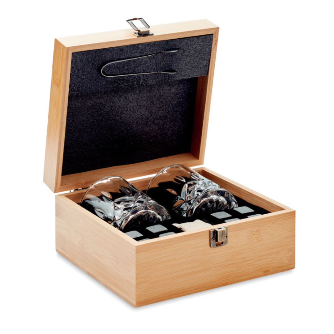 Whisky gift box with logo INVERNESS Luxury glass set in bamboo gift box for whiskey, gin, mojito or otherdrinks. Includes 2 glasses (300ml), 8 reusable stone ice cubes with storage cotton pouch and tongs. Bamboo is anatural product, there may beslight variations in colour and size per item, which can affect the finaldecoration outcome. Magnus Business Gifts is your partner for merchandising, gadgets or unique business gifts since 1967. Certified with Ecovadis gold!