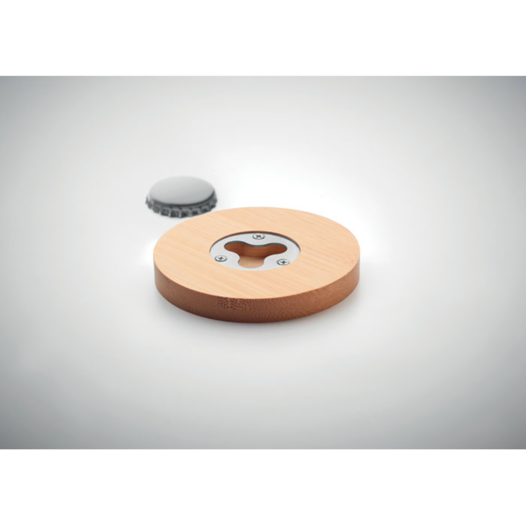 Gadget with logo Bottle opener DAKAI Bamboo bottle opener with coaster function. Bamboo is a natural product, there may be slight variations in colour and size per item, which can affect the final decoration outcome. Dimensions: Ø7,8X1CM Height: 1 cm Diameter: 7.8 cm Volume: 0.136 cdm3 Gross Weight: 0.039 kg Net Weight: 0.038 kg Magnus Business Gifts is your partner for merchandising, gadgets or unique business gifts since 1967. Certified with Ecovadis gold!