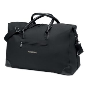 Sports bag with logo MONACO Sports bag with logo 340 gr/m² canvas with recycled PU details. Lining is in RPET 210D. Strong adjustable and detachable straps included. Perfect hand luggage size. Available color: Black Depending on the surface we can use embroidery, engraving, 360° imprint or screen print.