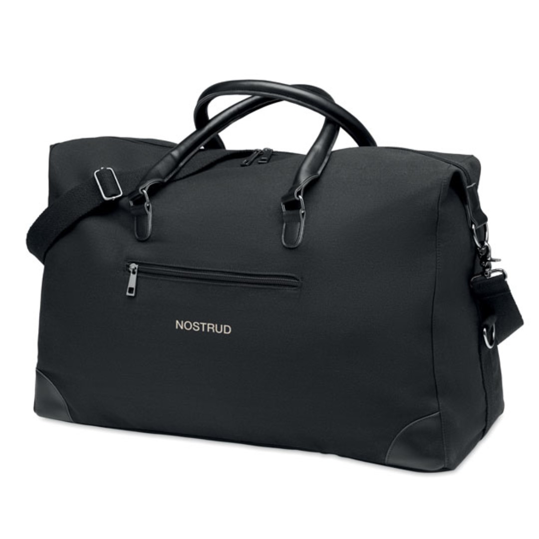Sports bag with logo MONACO Sports bag with logo 340 gr/m² canvas with recycled PU details. Lining is in RPET 210D. Strong adjustable and detachable straps included. Perfect hand luggage size. Available color: Black Depending on the surface we can use embroidery, engraving, 360° imprint or screen print.
