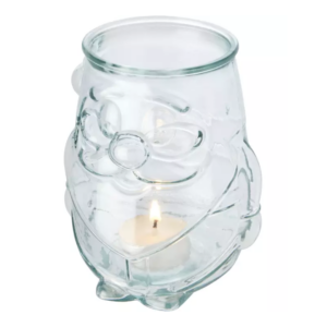 Gadget tealight holder in recycled glass Nouel Recycled glass tealight holder with Santa Claus shape. Made from 1 glass bottle. Recycled glass is manufactured using less energy, raw material, and additives, than what is required for making traditional glass. Tealight not included. Recycled glass. Magnus Business Gifts is your partner for merchandising, gadgets or unique business gifts since 1967. Certified with Ecovadis gold!