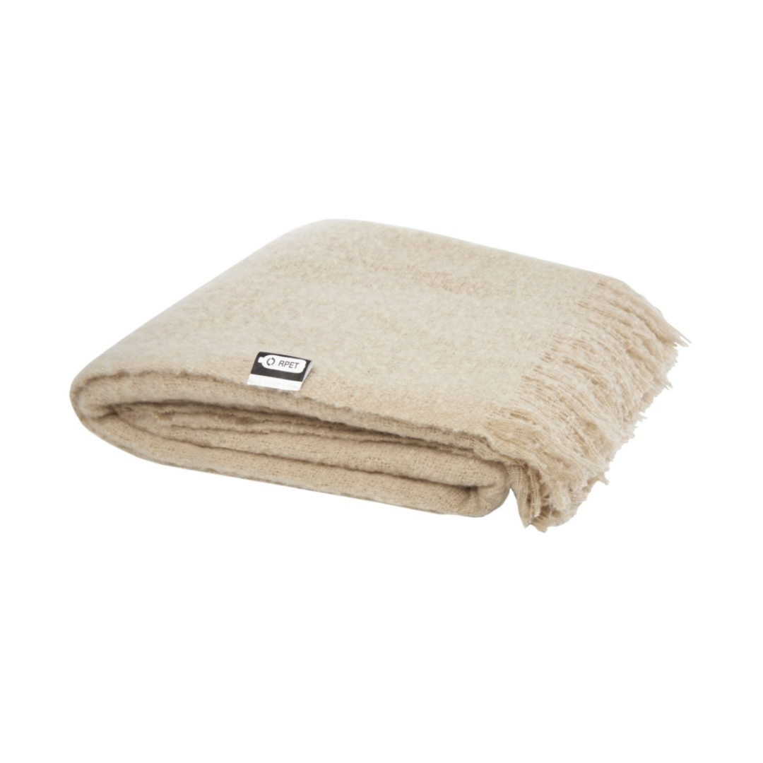 Gadget with logo PLAID blanket Ivy Gadget with logo Ultra-soft RPET mohair plaid, wrapped with a 190T RPET ribbon. Packed in a recycled poly bag. Fringes length: 10 cm on each side. Ribbon size: 72 cm x 4 cm. 100% Recycled Polyester, 215 g/m2, 190T of 100% Recycled Polyester. Available colors: Beige, Light Grey Depending on the surface we can use embroidery, engraving, 360° imprint or screen print.