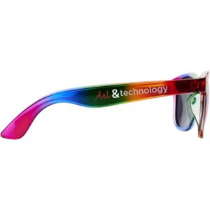Gadget with logo sunglasses Sun Ray. Step into the spotlight with our latest innovation, the Sun Ray Sunglasses! These retro-inspired shades are not just your average eye-wear; they're a statement piece that combines timeless design with contemporary flair. Crafted with a translucent frame adorned with an on-trend rainbow coloring finishing, these sunglasses are as stylish as they are functional. Compliant with EN ISO 12312-1 and UV 400 standards, the lenses boast a category 3 grading, providing exceptional protection against harmful UV rays. Made from high-quality PC Plastic, these sunglasses are designed to withstand the rigors of daily wear while keeping your eyes safe and comfortable. So, whether you're hitting the beach, attending a music festival, or simply soaking up the sun on a bright day, do it in style with the Sun Ray Sunglasses. Magnus Business Gifts is your partner for merchandising, gadgets or unique business gifts since 1967. Certified with Ecovadis gold!
