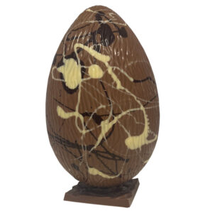 Chocolate with logo Large Easter egg What would Easter be without Easter eggs? So this delicious hand-moulded chocolate Easter egg of no less than 25 cm in size, approx. 400 grams. This king size Easter egg is made from the most delicious Belgian milk chocolate and decorated with splashes of dark and white chocolate. The result: a happy Easter for everyone. It is wonderful to receive or to give as a gift. Magnus Business Gifts is your partner for merchandising, gadgets or unique business gifts since 1967. Certified with Ecovadis gold!