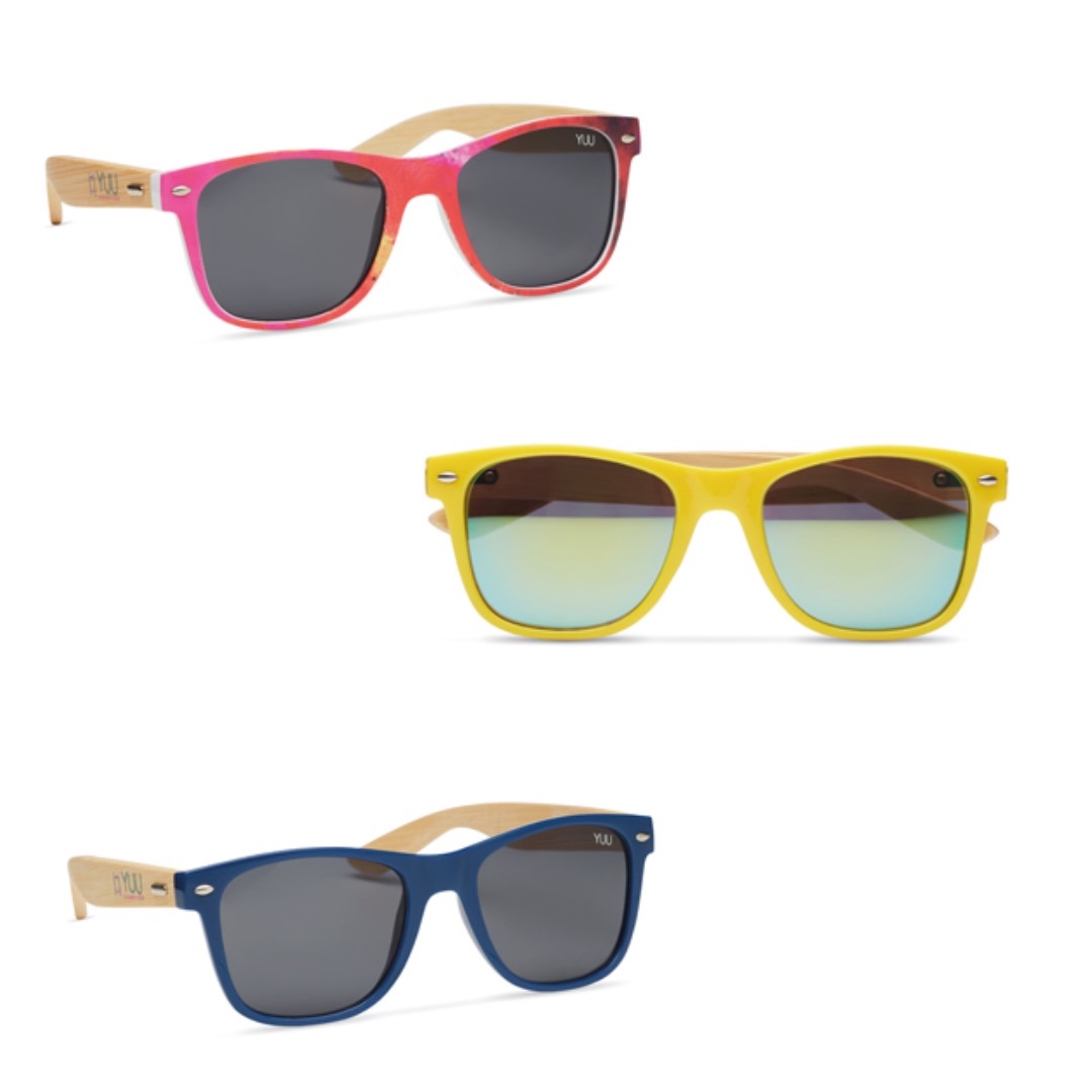 Gadget with logo Sunglasses with bamboo arms MPSG02 Gadget with logo Sunglasses with bamboo arms Create your favorite design gadget with logo Sunglasses - numerous possibilities. PC frame (rim) colour: choose one of the popular standard colors or have your PMS colour closely matched. Logo design: add a silkscreen logo on both bamboo arms Lens (UV400, CE): choose the dark tinted 'smoke' lens or change them for one of the colored 'mirrored' lenses. You can add a 1 colour logo on them or even add an allover pinhole sticker design. Greener packaging: the sunglasses are individually packed in a paper pouch. (image A) Add a full colour printed RPET pouch as a final touch! (image B)