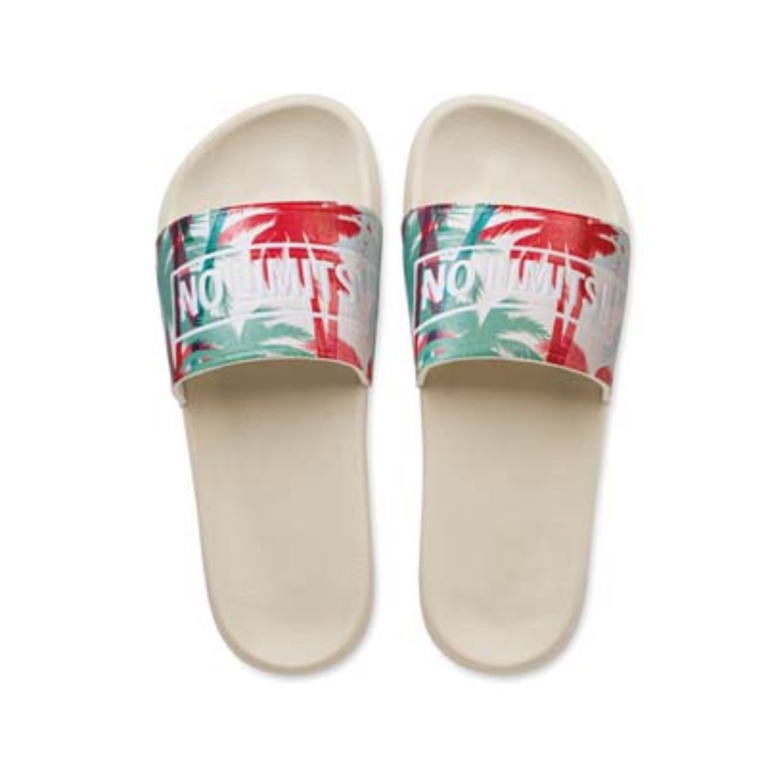Unisex slippers with logo Unisex slippers with logo in your design for the shower, beach or for daily use at home. The anti-slip EVA slipper can be printed on the PU strap with your 1 colour silkscreen logo or digitally all-over. If you are looking for a truly eye-catching result: combine a digitally printed strap with debossed outlines. Packaging: each pair is wrapped in tissue paper. Sizes 36-45.