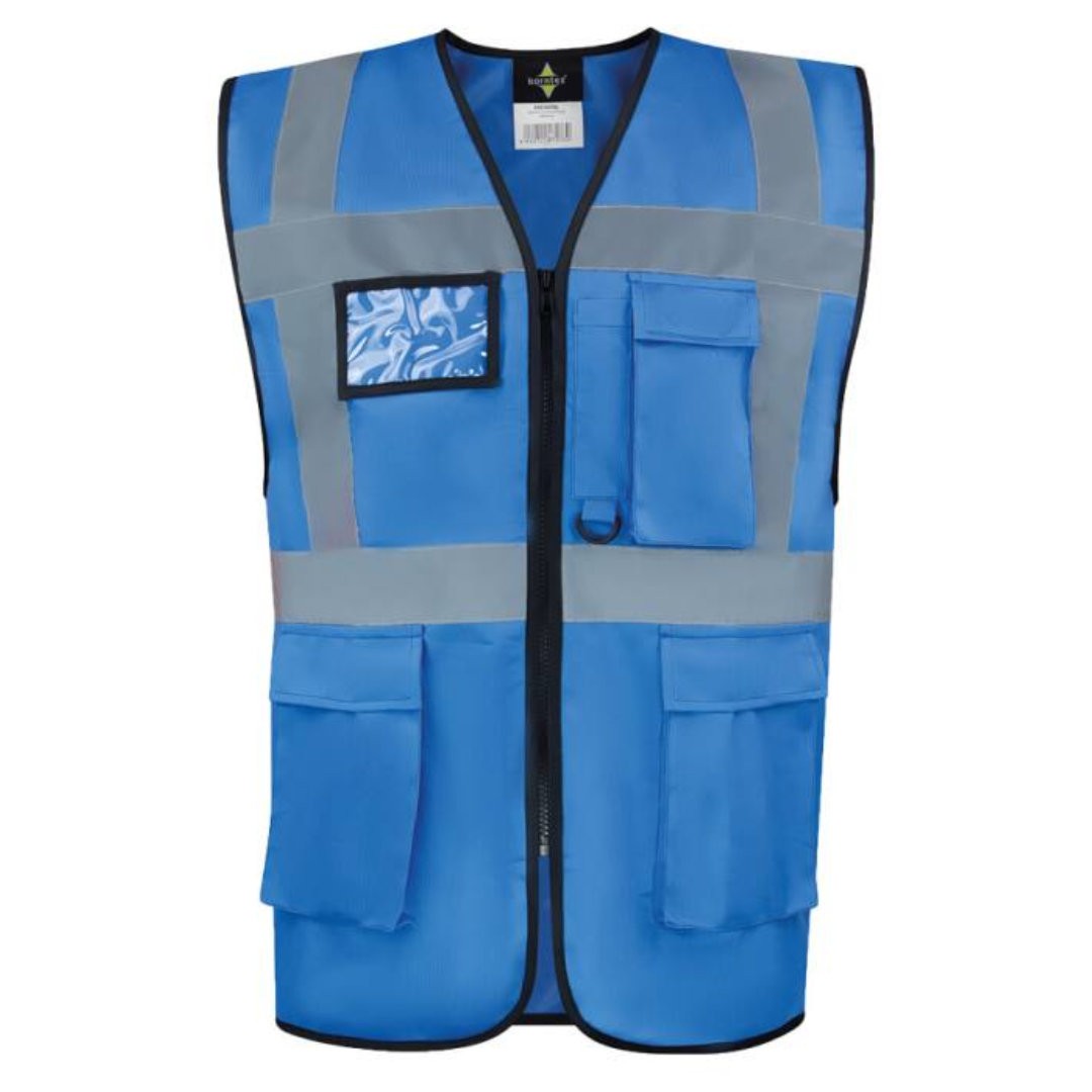 Safety vest with Logo Hamburg - Multi functional: ID-pocket, larger smartphone pocket, key ring - Two pockets with hook and loop closure, continuous zipper closure in the front - The colours and colour combinations in yellow and orange are certified according to EN ISO 20471:2013 - All „other“ colours are certified according to EN 17353 - Neon green and neon pink according to type AB3, all non-fluorescent colours according to type B3 - Four 5 cm wide reflective stripes (one across chest, one around body, two over the shoulders) - Continuous zipper closure in the front Available color: Sky Blue, Blue, Royal Blue, Neon Green, Green, Neon Pink, Red, Black Magnus Business Gifts is your partner for merchandising, gadgets or unique business gifts since 1967. Certified with Ecovadis gold!