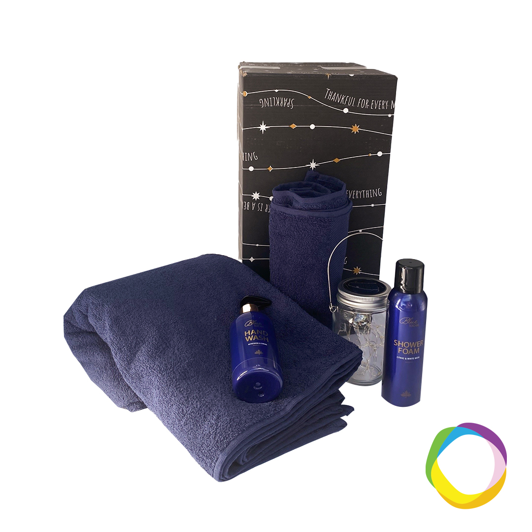 Wellness box Our wellness box is a carefully curated package that promotes health, relaxation, and self-care. This box contains a towel (50x100cm), bath towel (100x180cm), hand soap, solar mood light & shower foam. Soft quality towels in many colors available. Your logo embroidered or printed. Magnus Business Gifts is your partner for merchandising, gadgets or unique business gifts since 1967. Certified with Ecovadis gold!