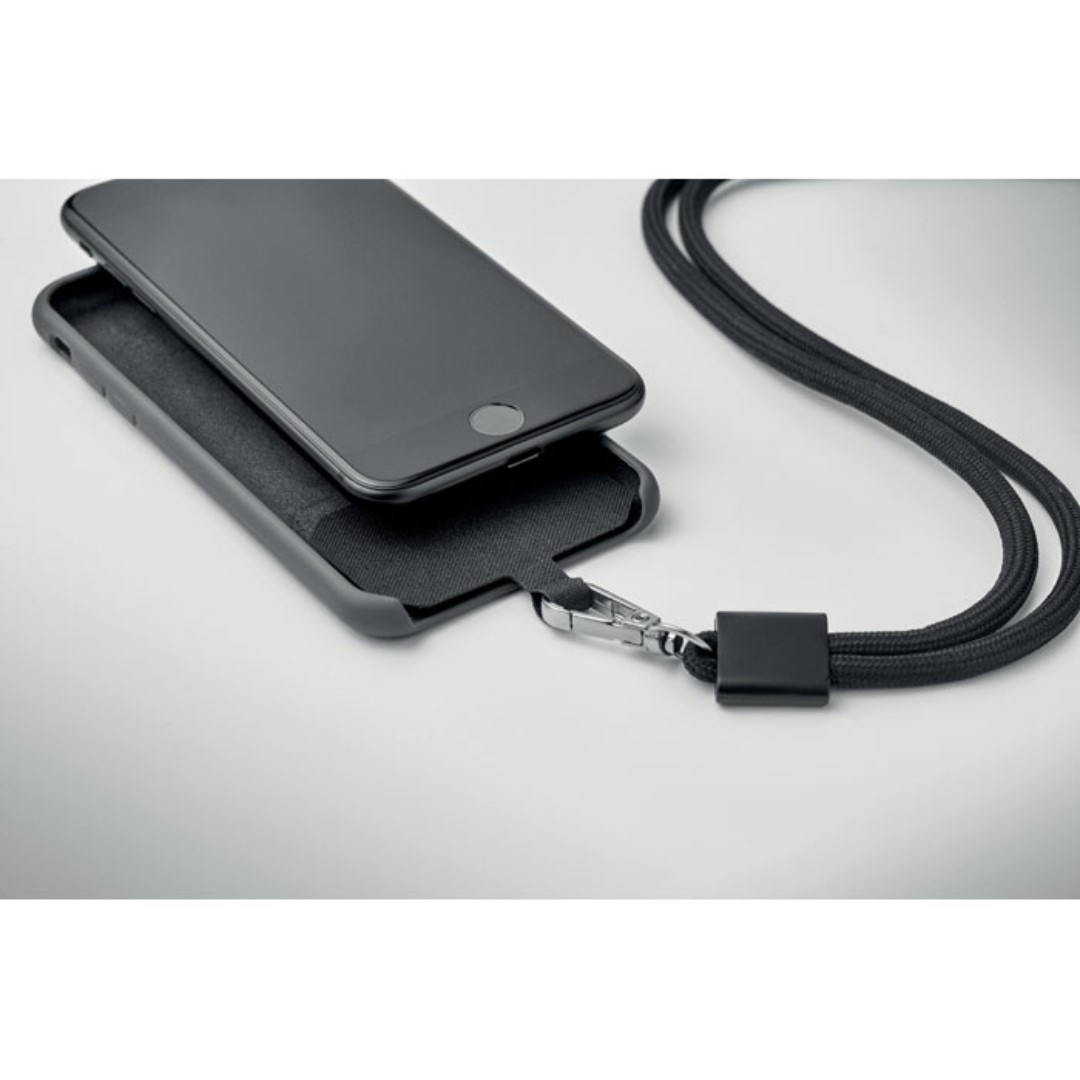 RPET Lanyard with phone holder In a world where smartphones have become an indispensable part of our lives, having easy access to your device is essential. Combine the convenience of a phone holder with the sustainability of RPET material with RPET phone holder lanyard. A stylish, Eco-friendly accessory that not only keeps your phone within reach but also reduces plastic waste. Dimensions : 1,500 X 6 mm. Colors : black. Net weight : 30 g. Magnus Business Gifts is your partner for merchandising, gadgets or unique business gifts since 1967. Certified with Ecovadis gold!