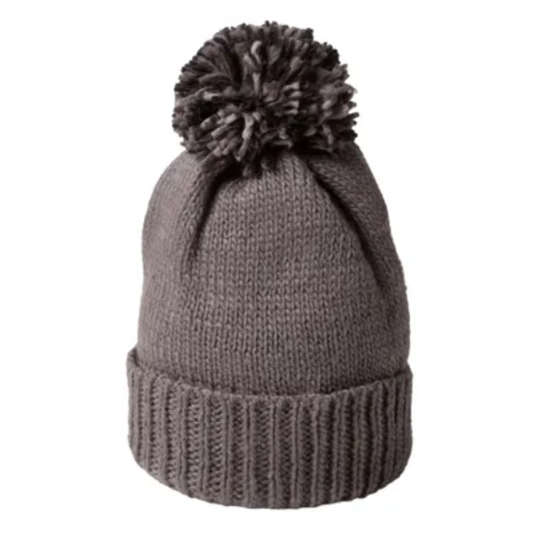 Heavy knitted pumpkin hat with logo A fashionable beanie with a large pompom. The cuff is perfect for a nice embroidery. This heavy knit beanie is made of 100% acrylic and features a wrap-around edge. The inside is finished with a border of fleece for a soft and warm feeling. Knitted hat with teddy lining, 100% acryl in structured knit. One size fits all. Magnus Business Gifts is your partner for merchandising, gadgets or unique business gifts since 1967. Certified with Ecovadis gold!