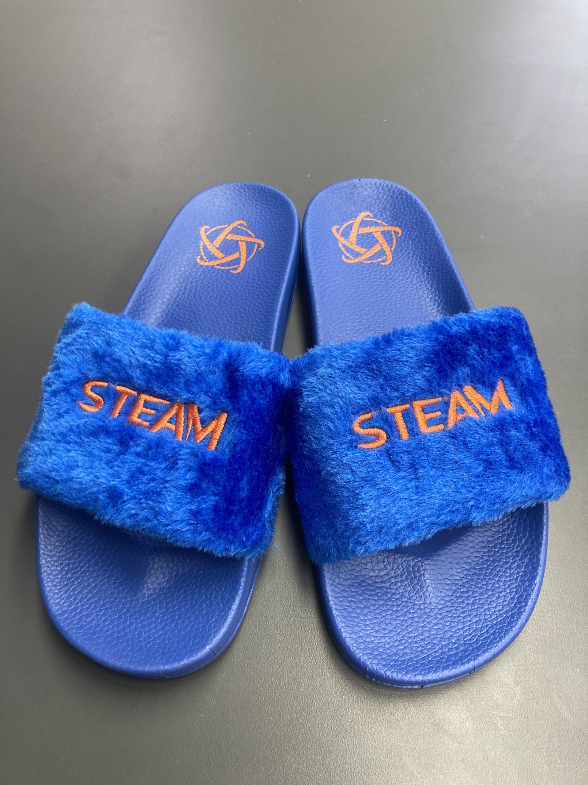 Sublimation slippers custom made Step into comfort with our exquisite custom-made slippers that redefine luxury and style. Our artisan-crafted slippers are designed to provide the perfect blend of coziness and elegance, tailored to suit your unique preferences. Choose from a variety of materials and personalize every detail, from color to embroidery, to create a pair that reflects your individual taste. REQUEST A FREE QUOTE The easiest way to kick off your design process is to request a quote. In your request, you can share your idea, your deadline, and send us images of your character. Magnus Business Gifts is your partner for merchandising, gadgets or unique business gifts since 1967. Certified with Ecovadis gold!