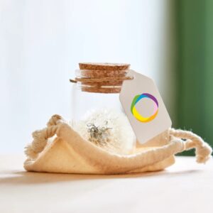 Wish Flower in small glass bowl Unveiling our Wish Flower Delight – a captivating and personalized gift encased in a small glass bowl, ready to bring a touch of magic to any occasion. This enchanting token is not just a decorative piece; it's a symbol of dreams and aspirations, made uniquely yours with the addition of your logo and text. Carefully crafted to inspire wonder, our Wish Flower Delight is presented in a charming glass bowl, creating a visual masterpiece that radiates elegance and grace. REQUEST A FREE QUOTE The easiest way to kick off your design process is to request a quote. In your request, you can share your idea, your deadline, and send us images of your character. Magnus Business Gifts is your partner for merchandising, gadgets or unique business gifts since 1967. Certified with Ecovadis gold!
