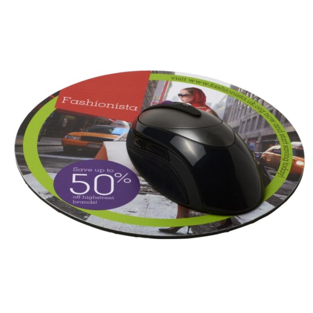Mouse Mat with logo Introducing our premium custom logo mouse pads, the perfect accessory to elevate your desktop experience. Crafted with durability and style in mind, these mouse pads are available in both round and rectangular shapes. Fully Customizable with vibrant full-color printing to showcase your brand or personal design. Whether you're working, gaming, or browsing the web, our mouse pads provide a smooth and precise surface for optimal mouse movement and control. Made from high-quality materials, they are built to withstand daily use and provide long-lasting performance. Our mouse pads are fully Customizable, allowing you to add your logo, artwork, or message in full color. With vibrant printing capabilities, your design will pop against the sleek surface of the mouse pad, making it a standout addition to your desk. REQUEST A FREE QUOTE The easiest way to kick off your design process is to request a quote. In your request, you can share your idea, your deadline, and send us images of your character. MOQ required. Magnus Business Gifts is your partner for merchandising, gadgets or unique business gifts since 1967. Certified with Ecovadis gold!